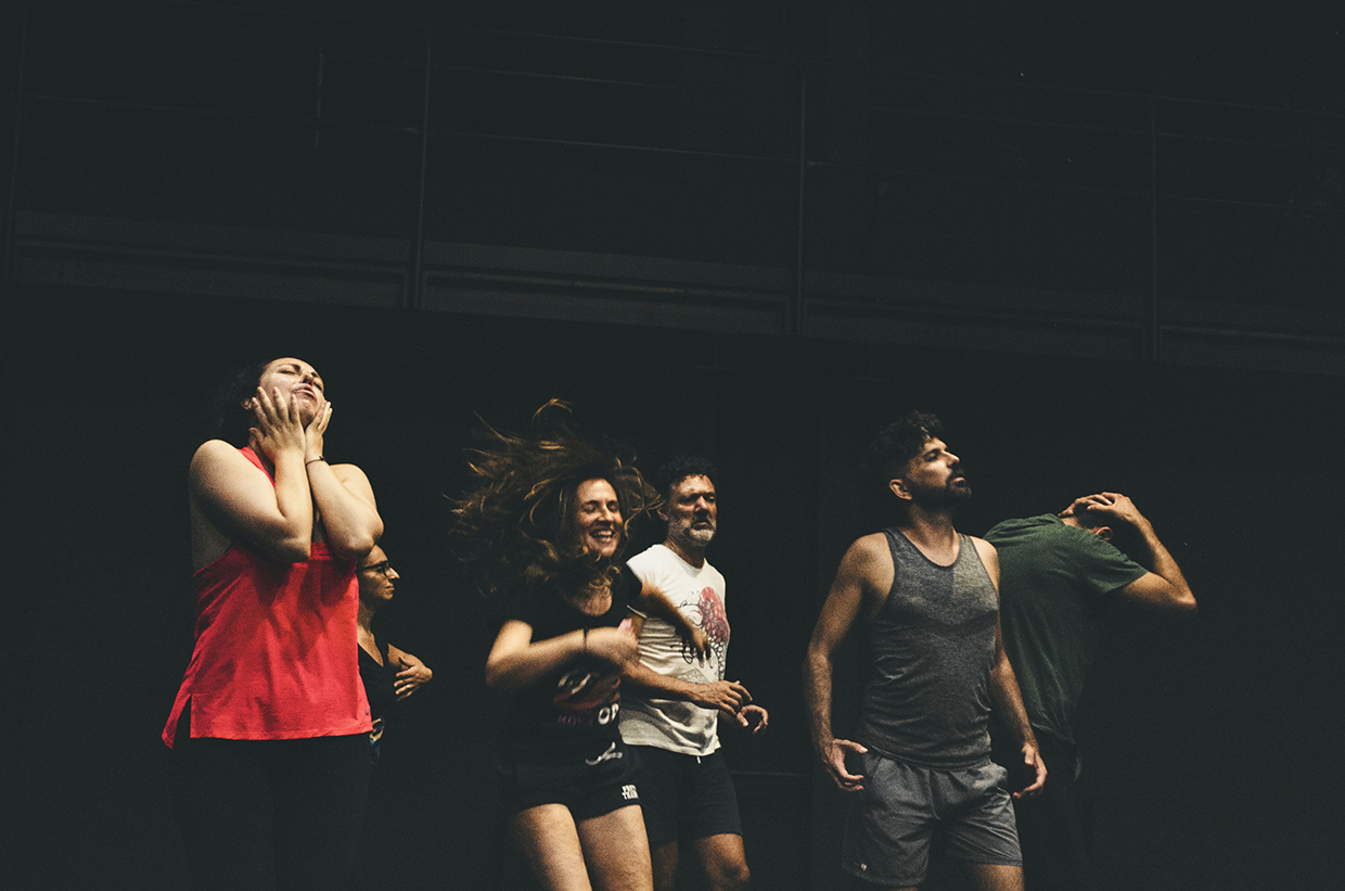 In the photo there are some members of the movin'op theater company during the rehearsals of a theatrical show